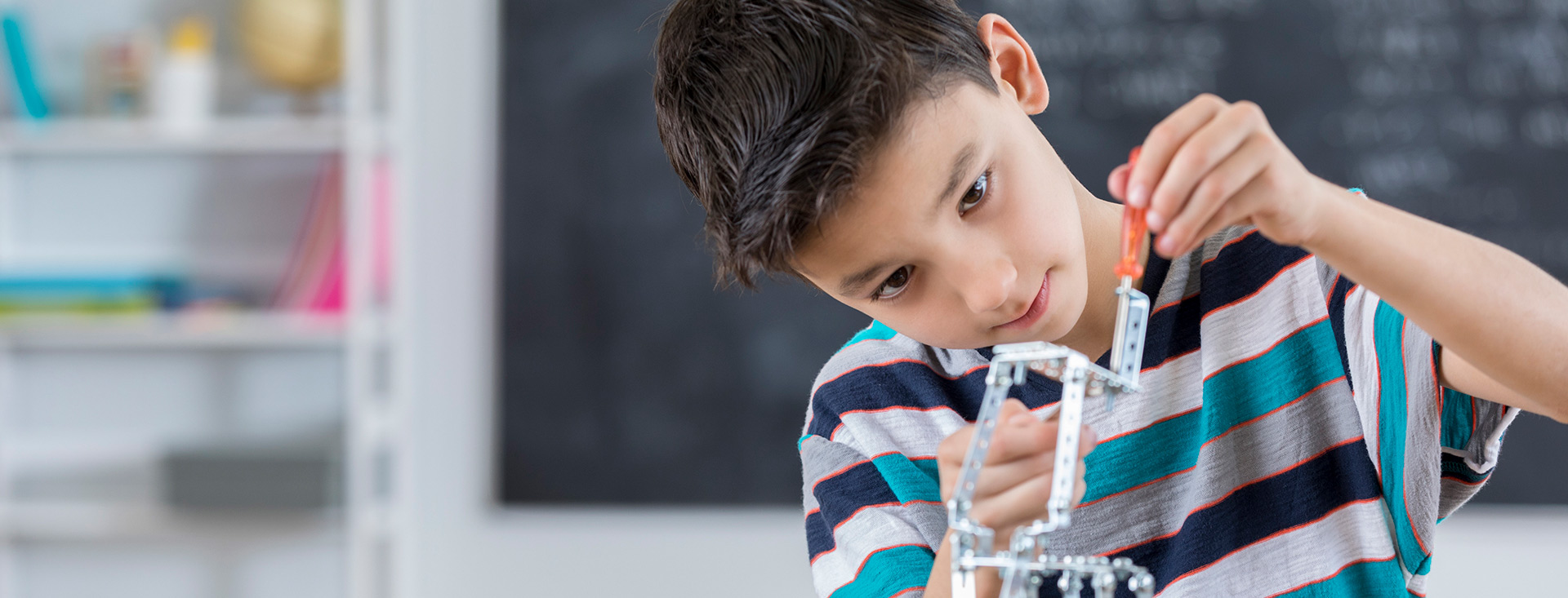 young boy in class